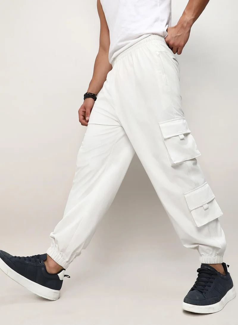 CAHOOT  Men's Egg White Cuffed Hem Cargo Trousers For Casual Wear | 8 Pockets | Relaxed Fit | Button Closure | Cargo Pants Crafted With Comfort Fit For Everyday Wear for Men | Best Price UAE
